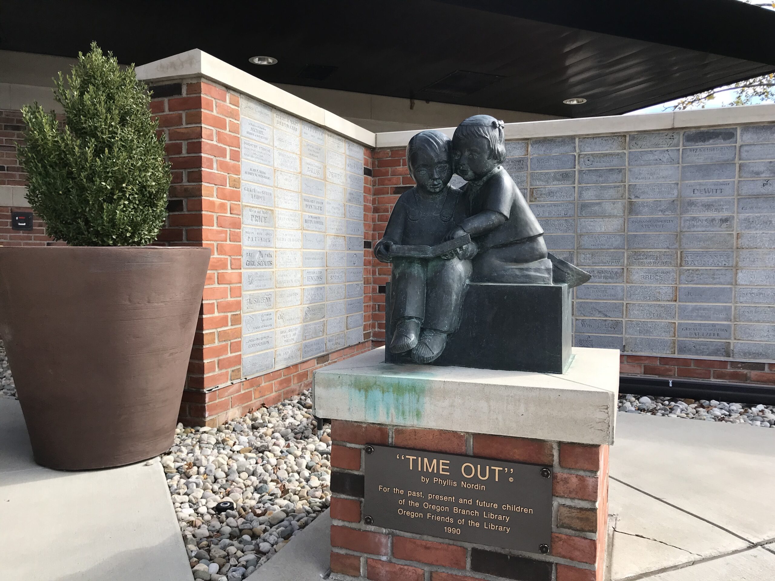 Oregon Statue scaled Image of Oregon Branch Library Time Out statue located outside of the branch