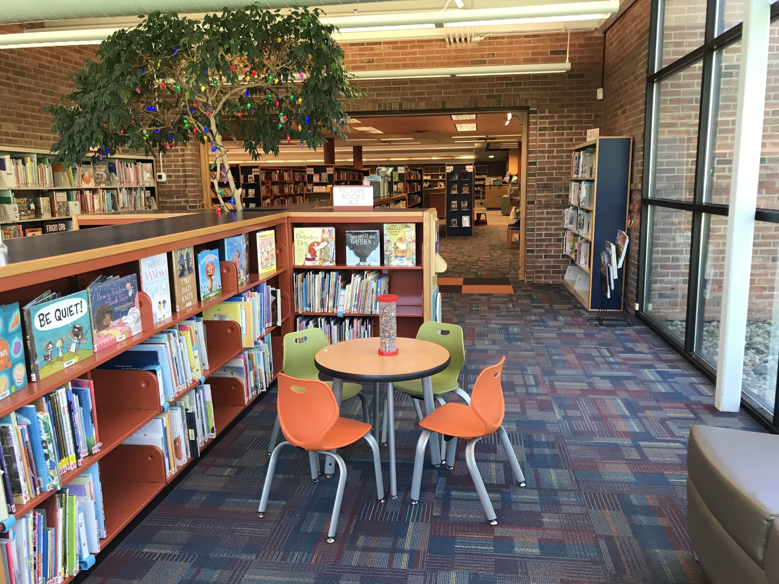 Washington Childrens I scaled Inside Washington Branch showing seating and picture books