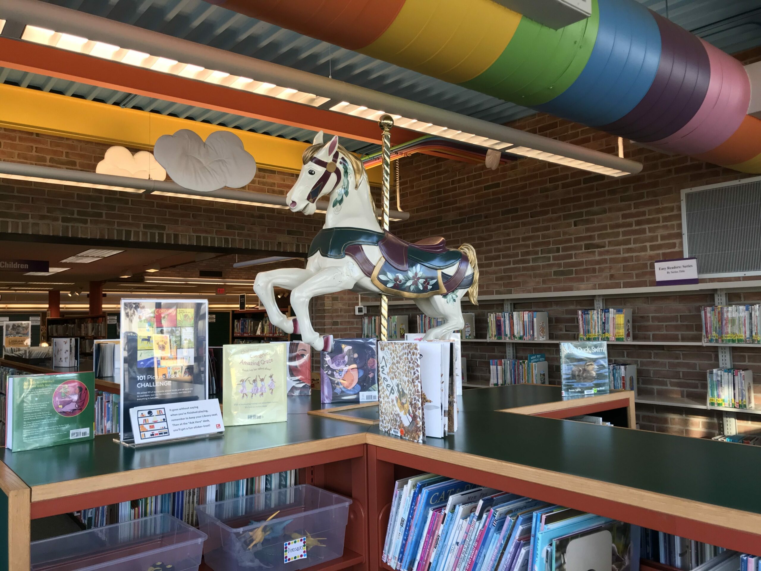 hollandchildrens scaled inside holland branch showing a carousel horse on top of a shelf