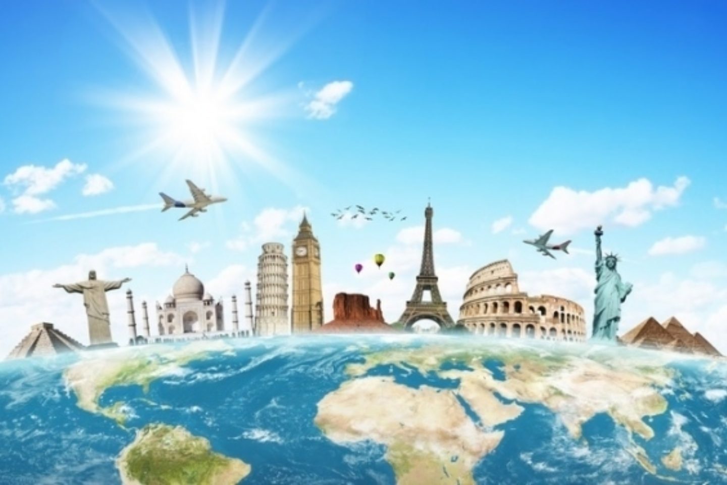 Computer-generated advertisement of two planes flying over iconic landmarks from around the world. Beneath them is a spread-out view of the globe showing the various continents.