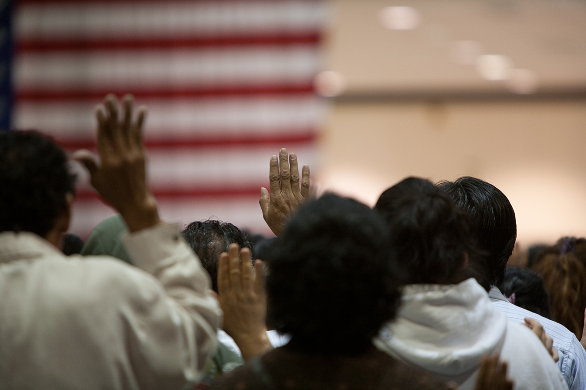 Immigrants at a swearing in ceremony