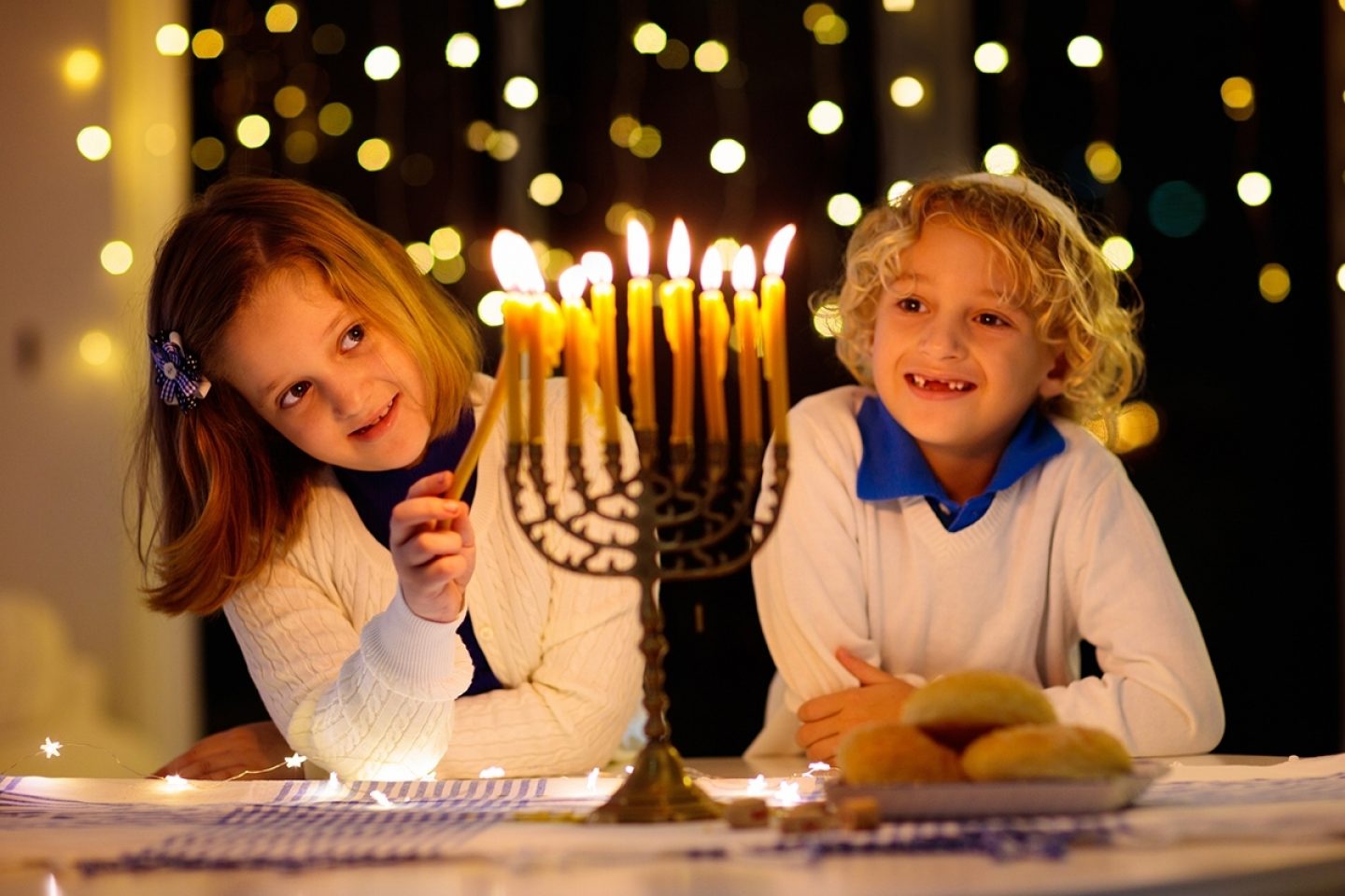 Kids celebrating Hanukkah