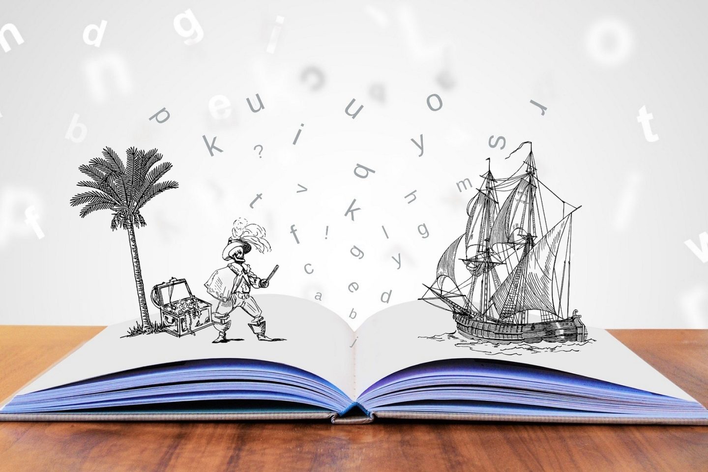 A book with blank pages is open on a wooden table. Above the book's open pages are illustrations of a pirate scene. The left side of the book shows a palm tree, an open treasure chest, and a skeleton pirate. The pirate faces the right side of the book where a ship is sailing in the water. Above this are various letters and symbols floating in the air throughout the background.