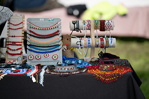 Handmade beaded jewelry on display at market