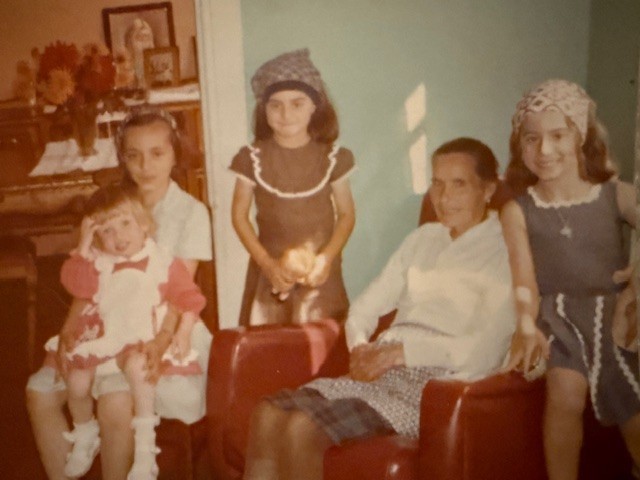 Christine Mayle ) with Vovo (grandma) and first cousins in Portugal