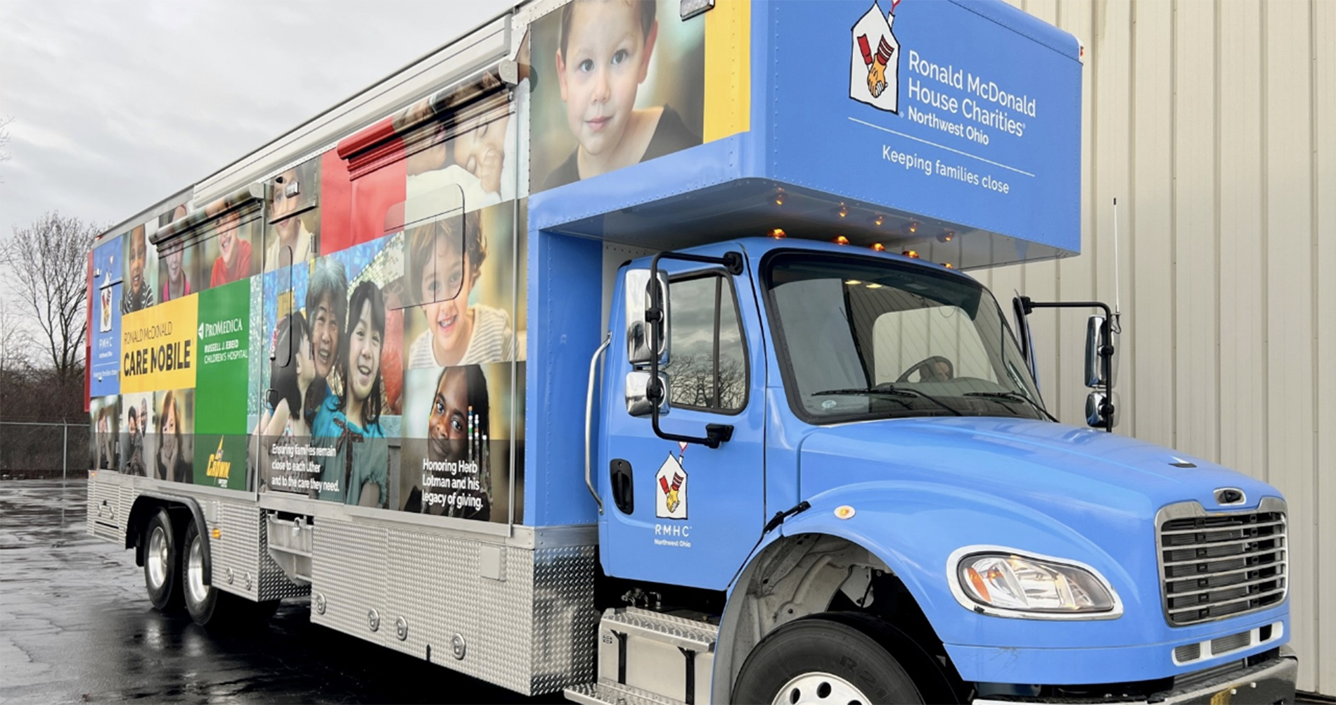 Screenshot Dollar bill folded and wrapped with a red ribbon.