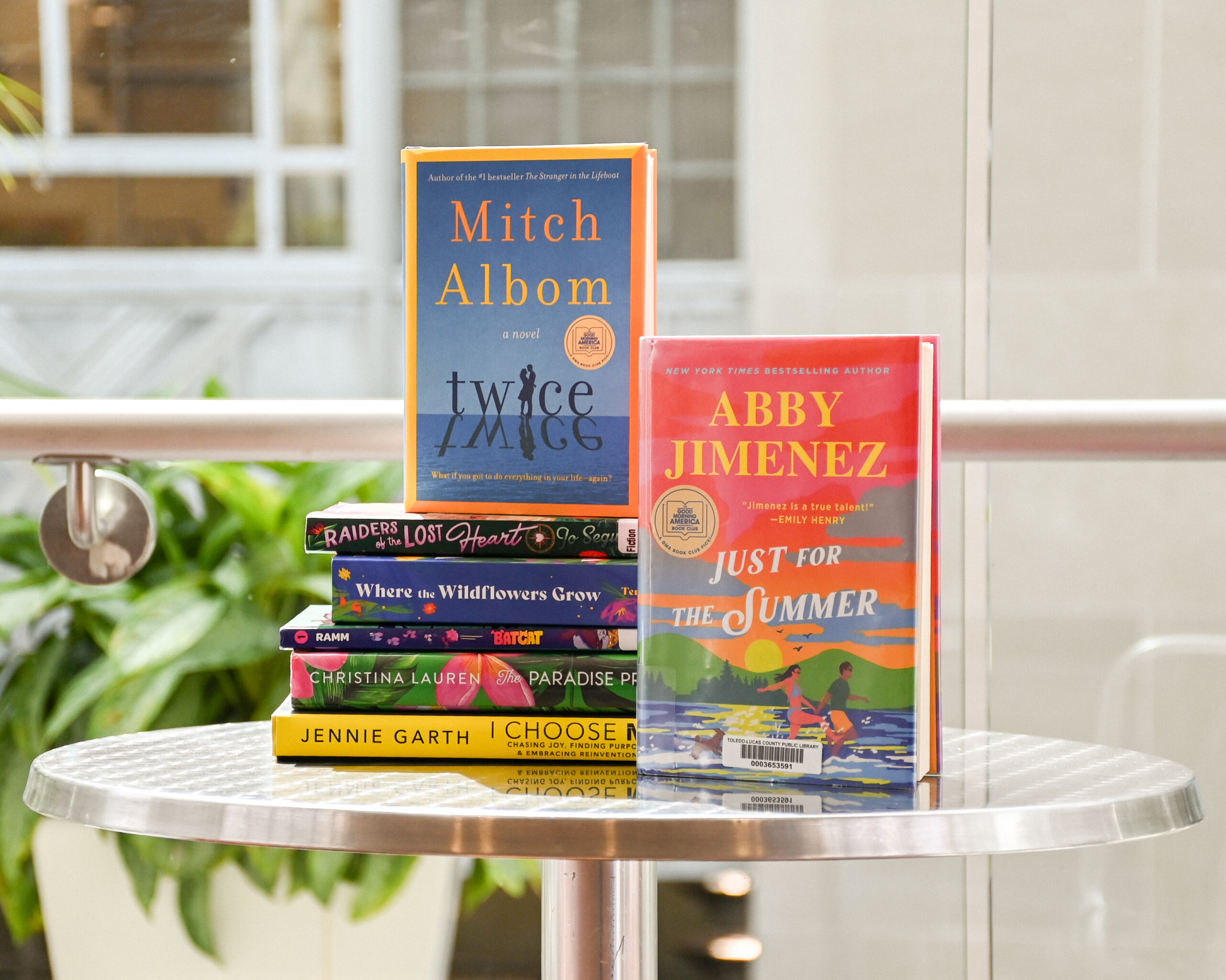 Stack of 7 books including Just for the Summer by Abby Jimenez and Twice by Mitch Albom Stack of 7 books including Just for the Summer by Abby Jimenez and Twice by Mitch Albom