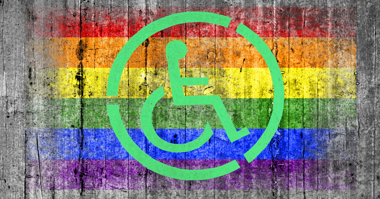 International symbol of access over a rainbow flag.